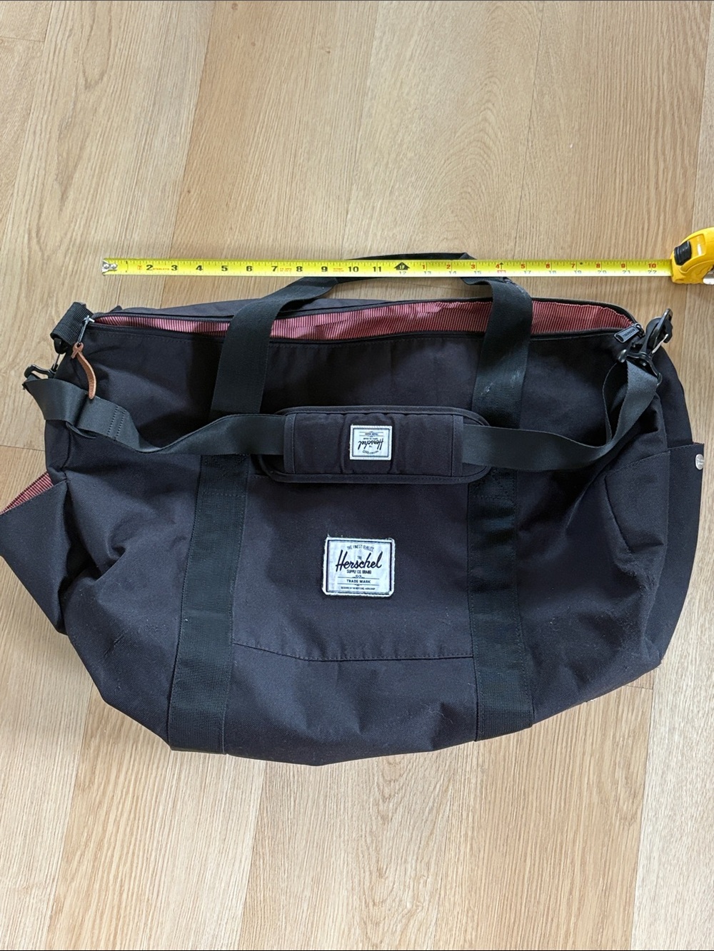 Herschel Supply Company Black Duffel with Burgundy Interior Trim